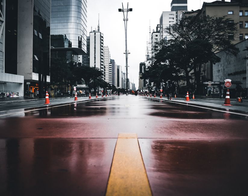 Discover the urban beauty of Paulista Avenue under a rainy sky in São Paulo, Brazil.