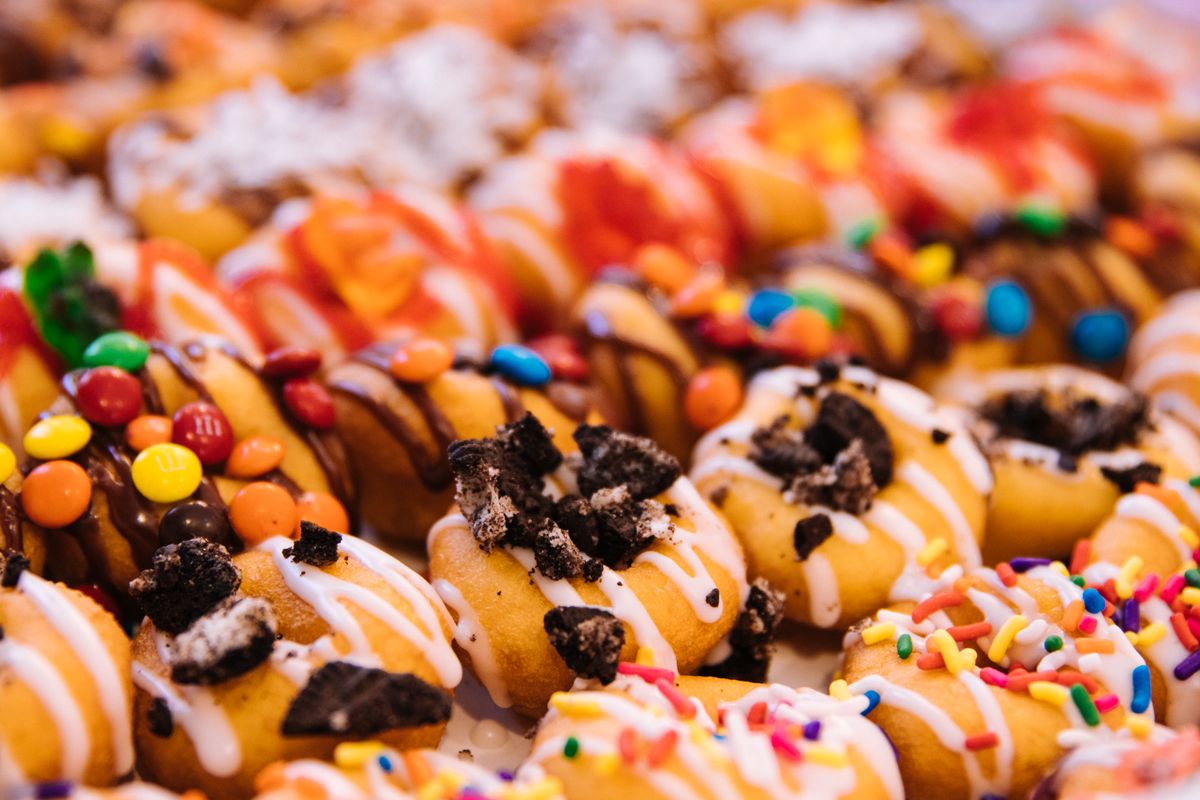 Assorted donuts with chocolate drizzle