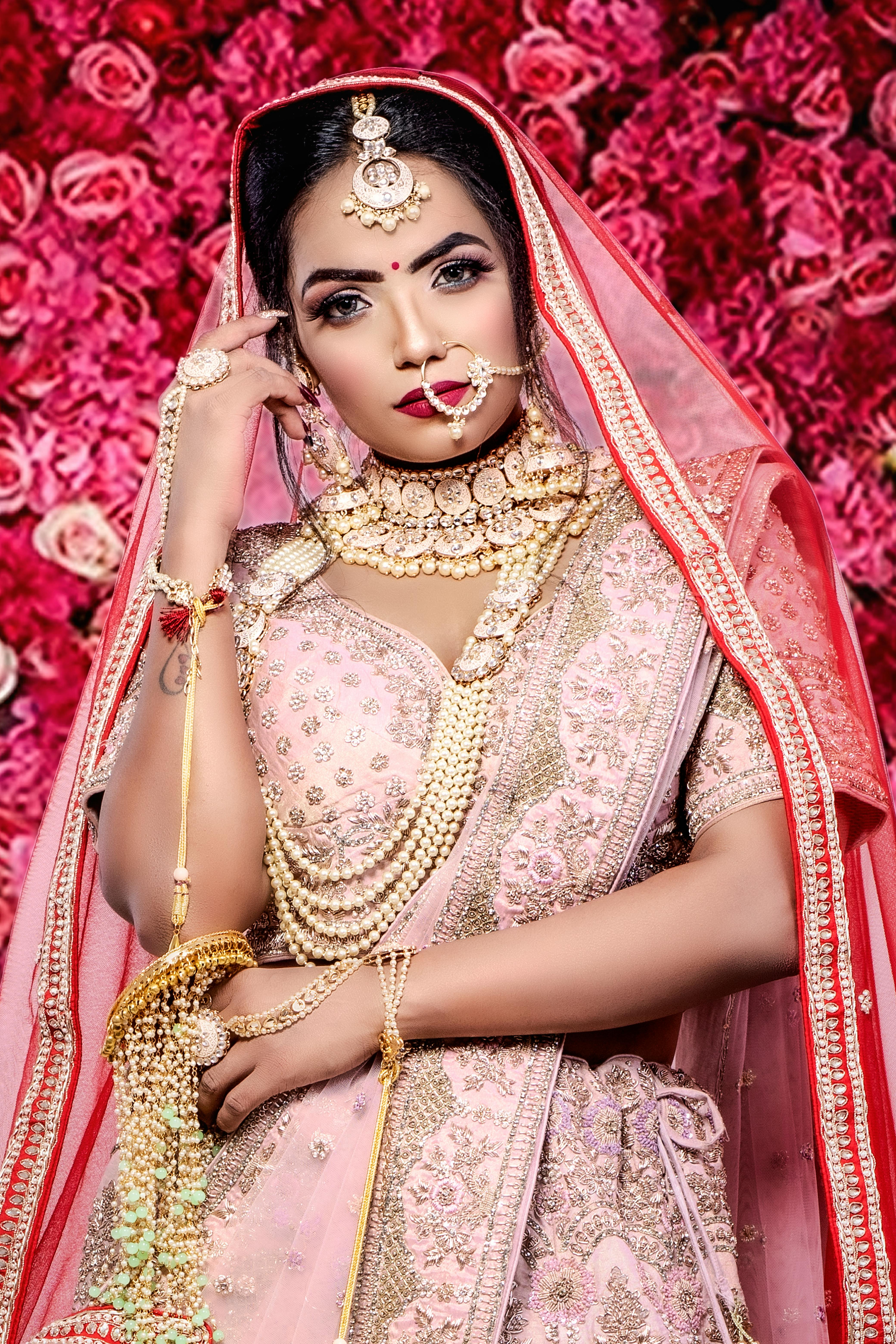 Woman in White and Pink Floral Dress Wearing Hijab