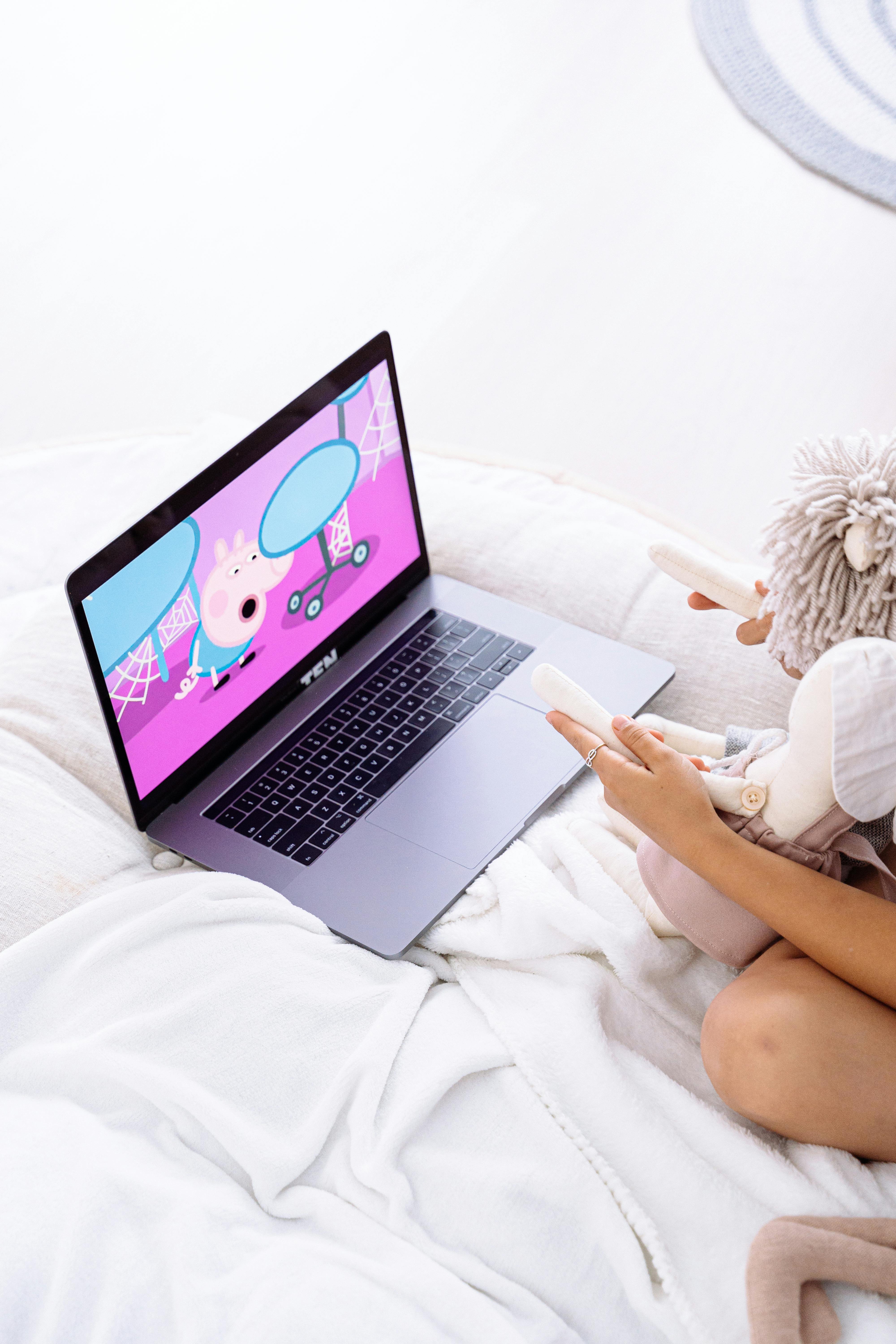 a laptop on the bed