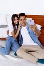 Man and Woman Sitting on Couch