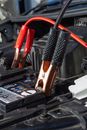 Close-up of Charging Car with Clamps