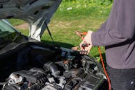 Close-up of Man Repairing Car