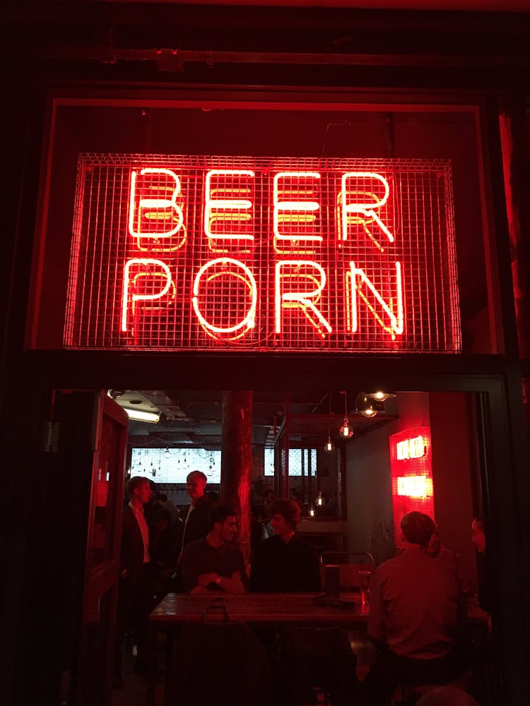 Red Neon Sign At The Bar