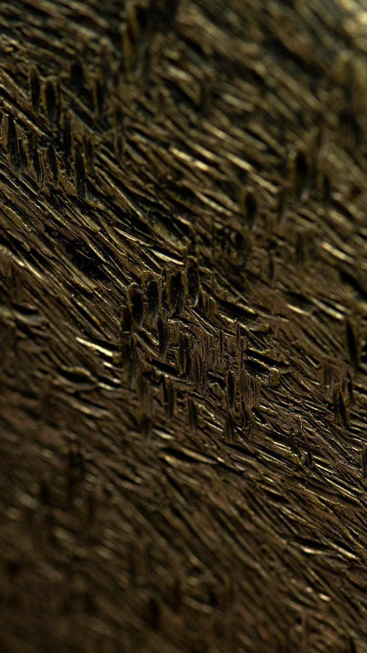 Close Up Of Impressed Texture In Bronze 