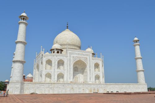 Free A stunning low-angle shot of the Taj Mahal, showcasing its iconic domes and minarets. Stock Photo