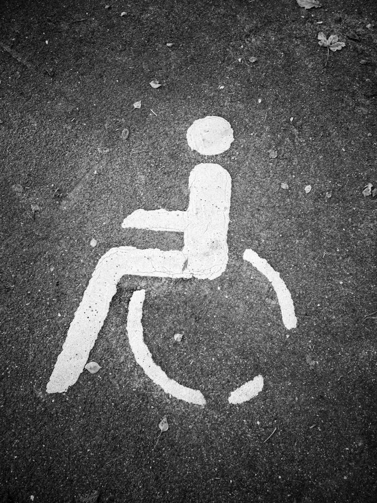 Photo Of Handicap Logo On Ground