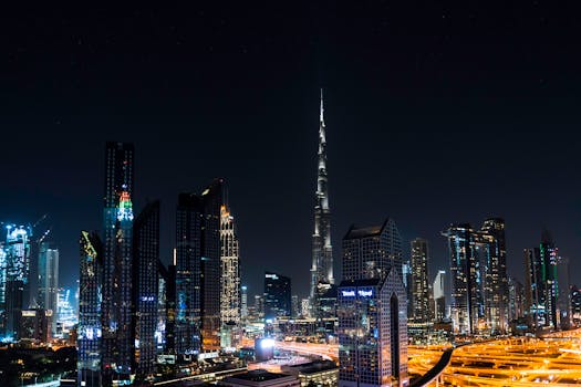 Stunning nighttime view of Dubai's skyline with the iconic Burj Khalifa illuminated under a starry sky.