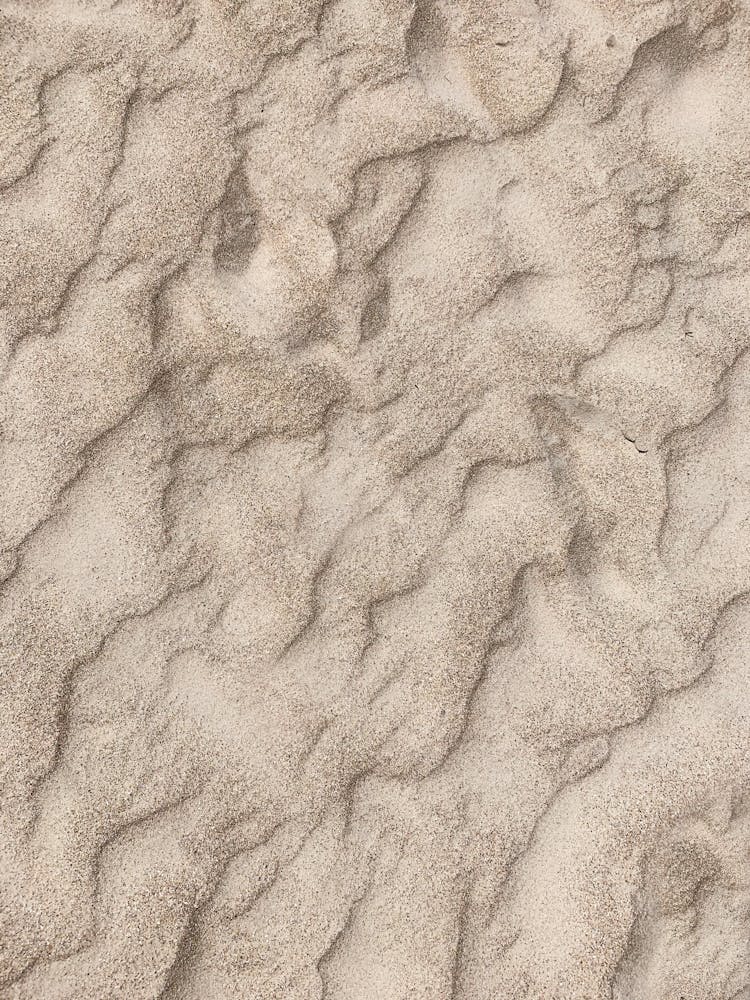 Close-up Photo Of Sand Patterns 