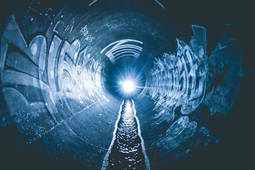 Free Bright Light on a Dark Tunnel Stock Photo