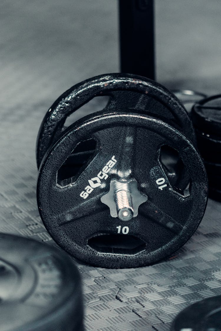 Heavy Iron Dumbbell On Rubber Gym Floor