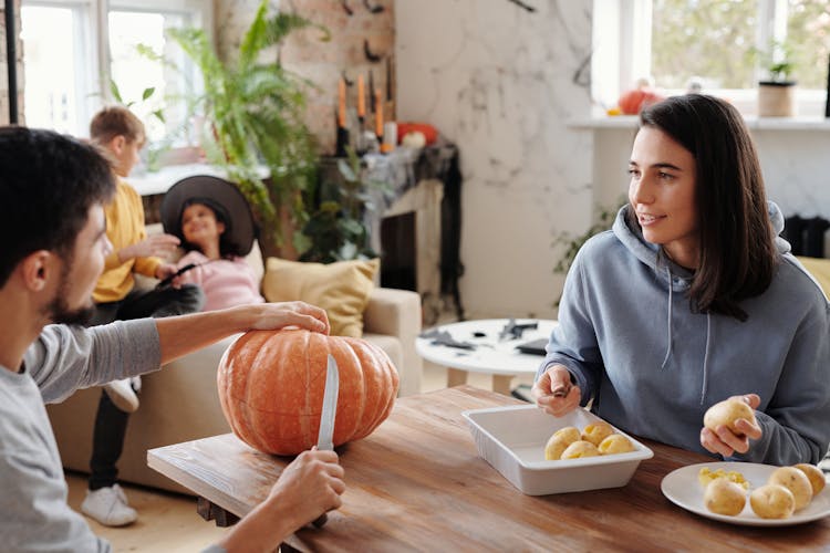 A Family Preparing For Halloween