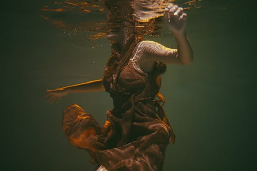 Woman's Body submerged Underwater 