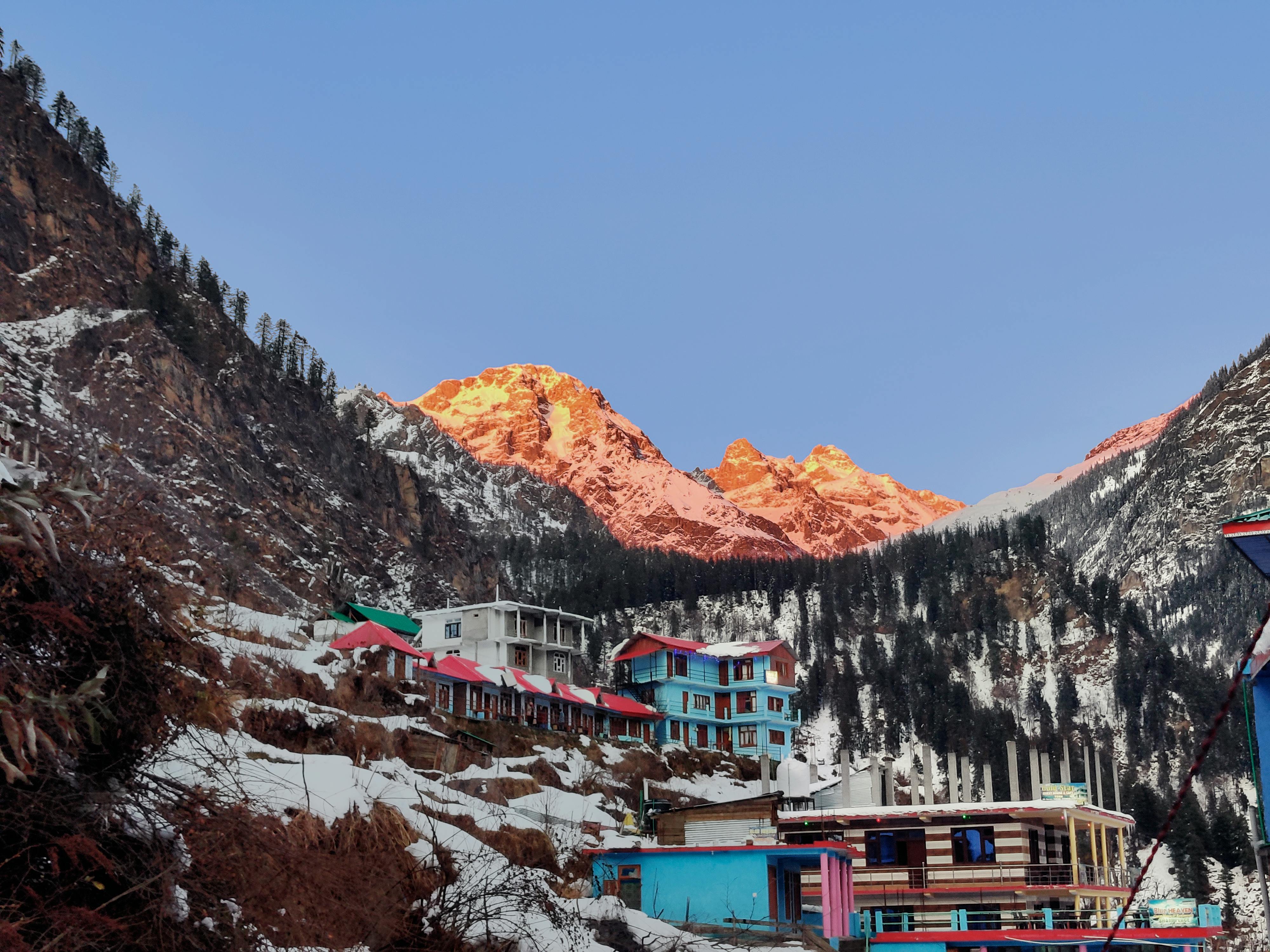 Large sports arena filled with fans under bright lights