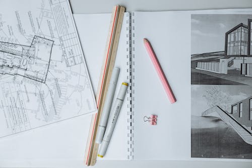 Free Pen and Ruler on Top of Drawing Pad  Stock Photo