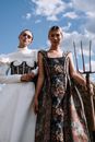 Low-Angle Shot of Women in Stylish Outfits