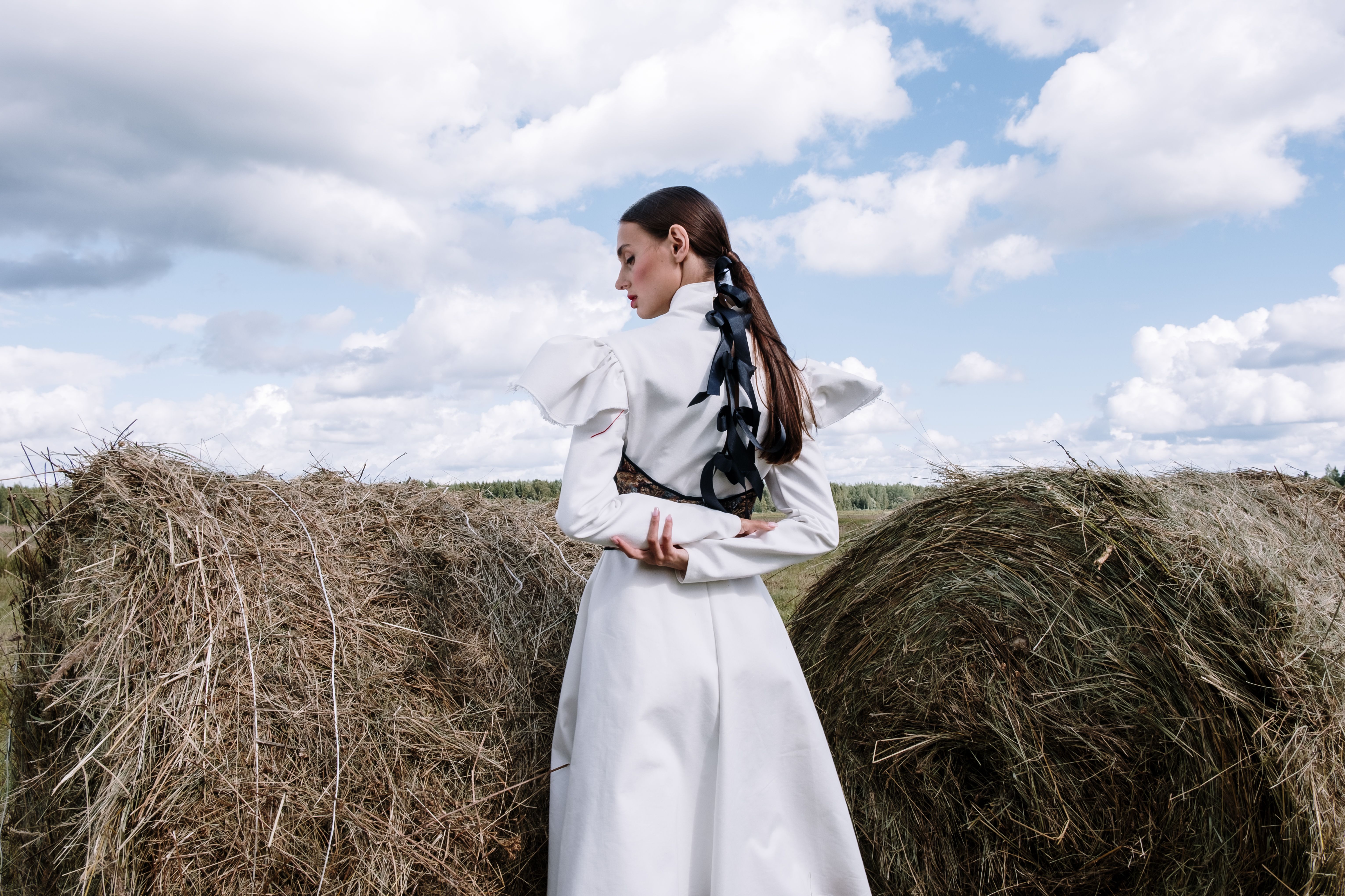 Woman in White Long Sleeve Dress Standing · Free Stock Photo