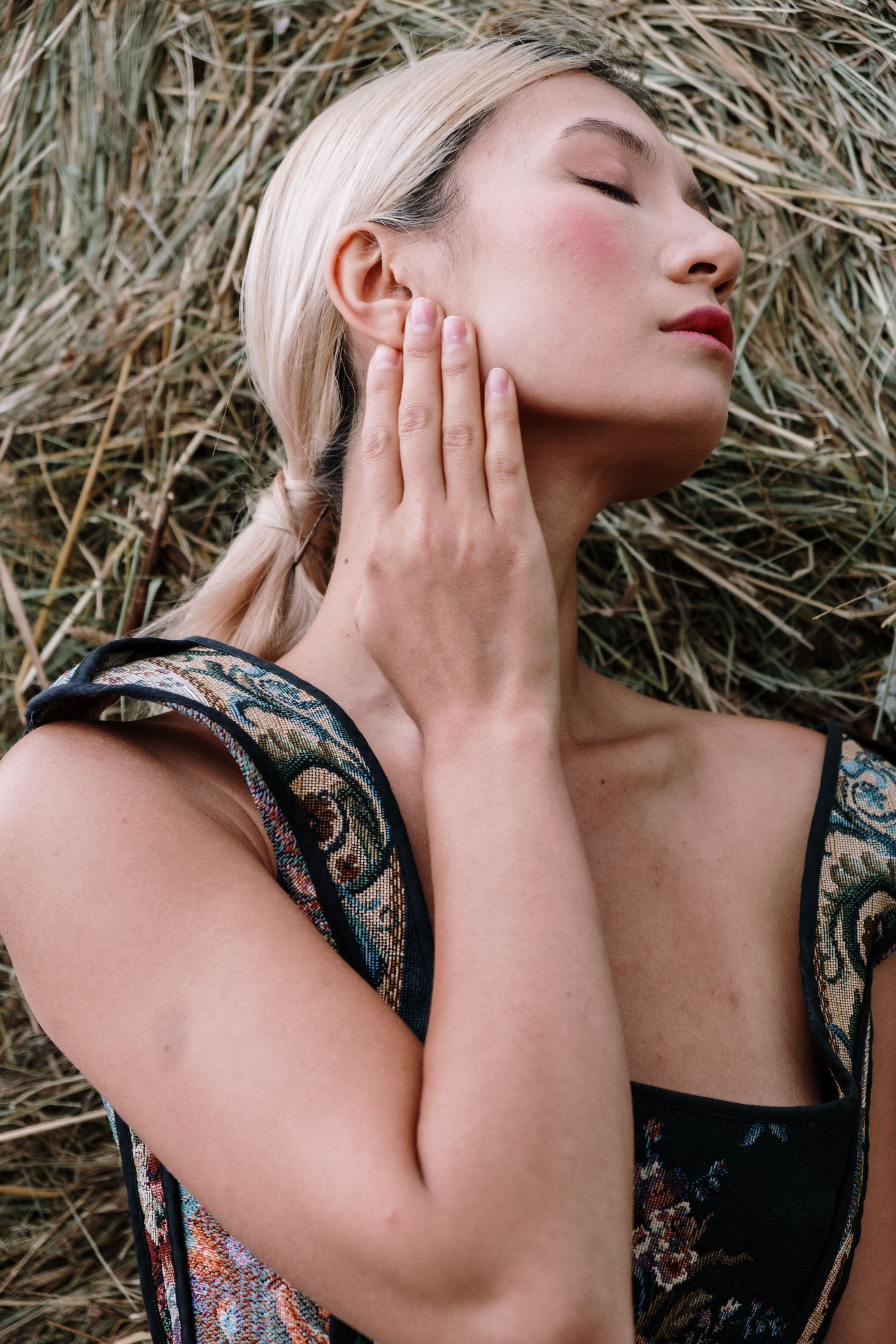 Woman Touching Her Neck · Free Stock Photo
