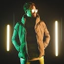 A Man Wearing a Jacket and Sunglasses