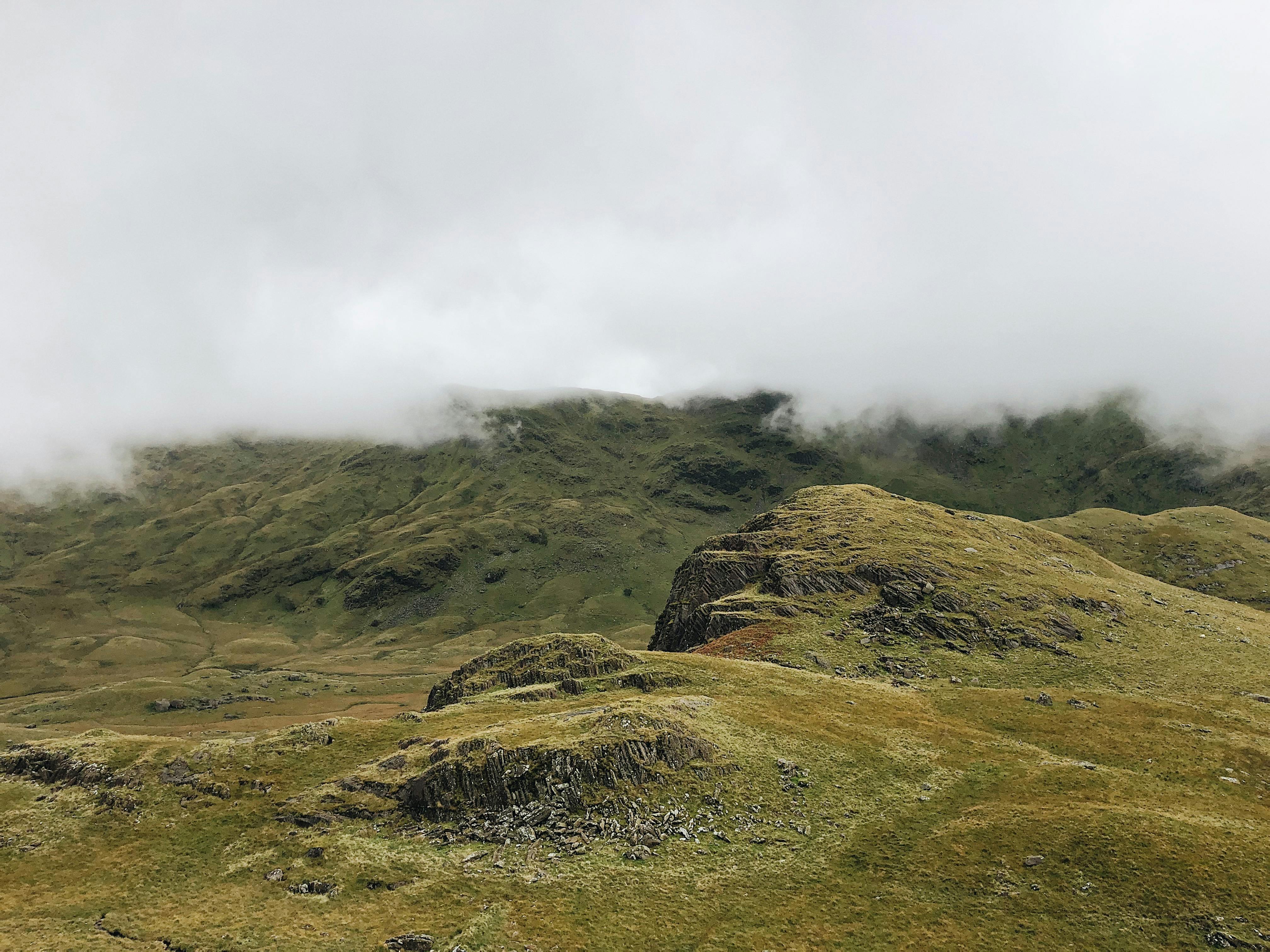 Serene misty mountain landscape in Gwynedd, Wales capturing nature's tranquility.