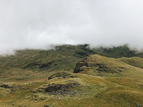 Free Serene misty mountain landscape in Gwynedd, Wales capturing nature's tranquility. Stock Photo