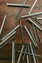 Silver Tube on Brown Textile