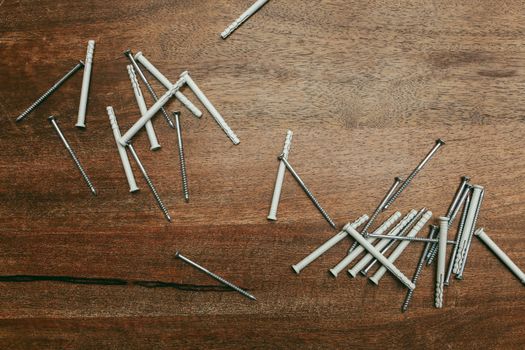 Close-up Photo of Screws and Nylon Fixers