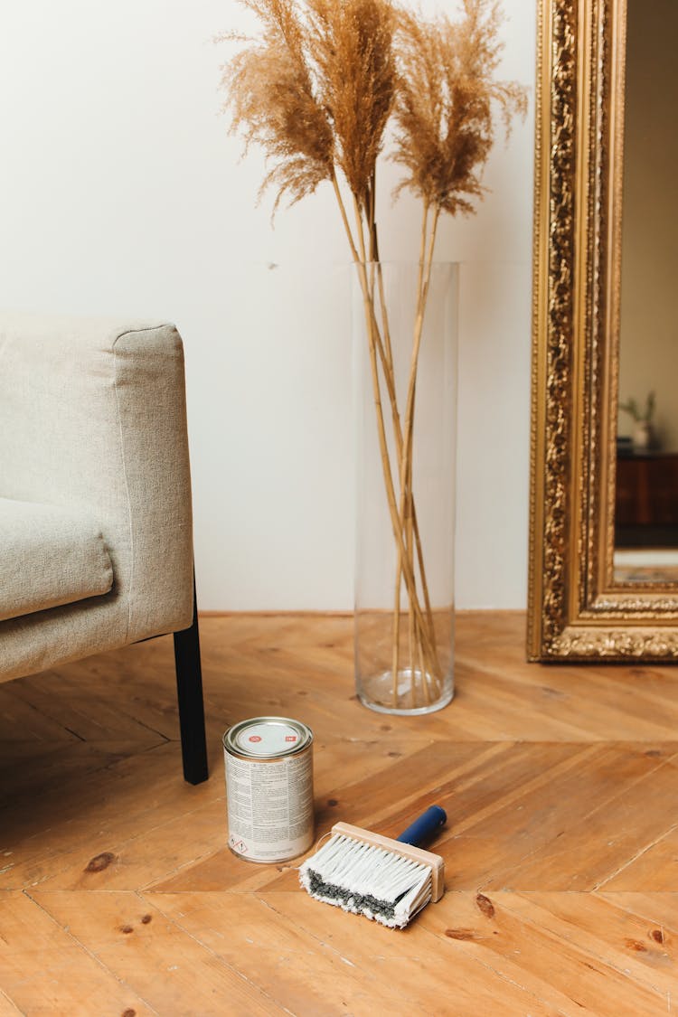 White Paint Can On Wooden Floor