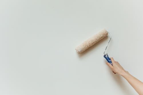 Free Brown Thread Roll on White Table Stock Photo