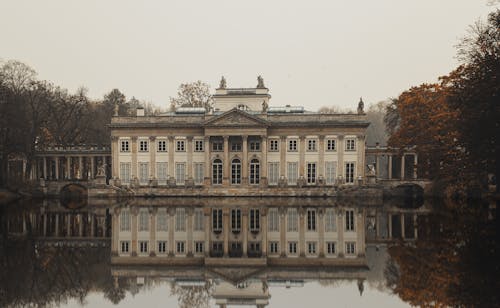 Reflection of Concrete Building in the Water 