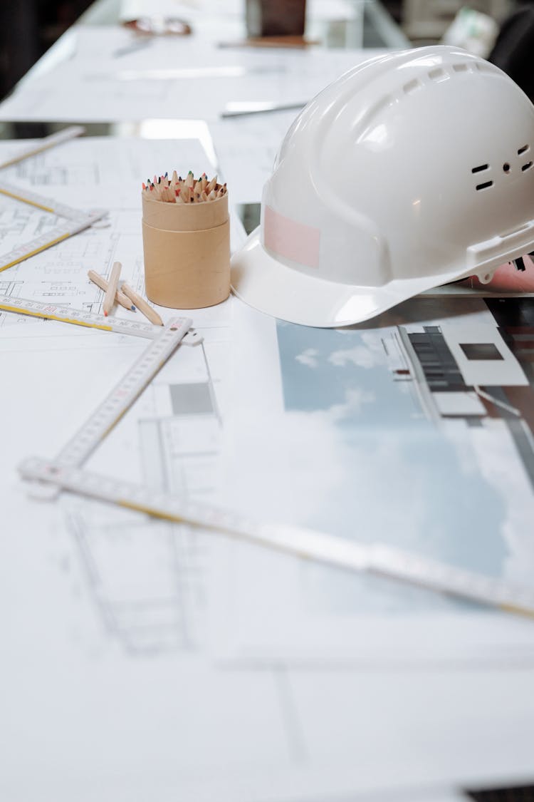 Hard Hat Near The Kraft Paper Jar