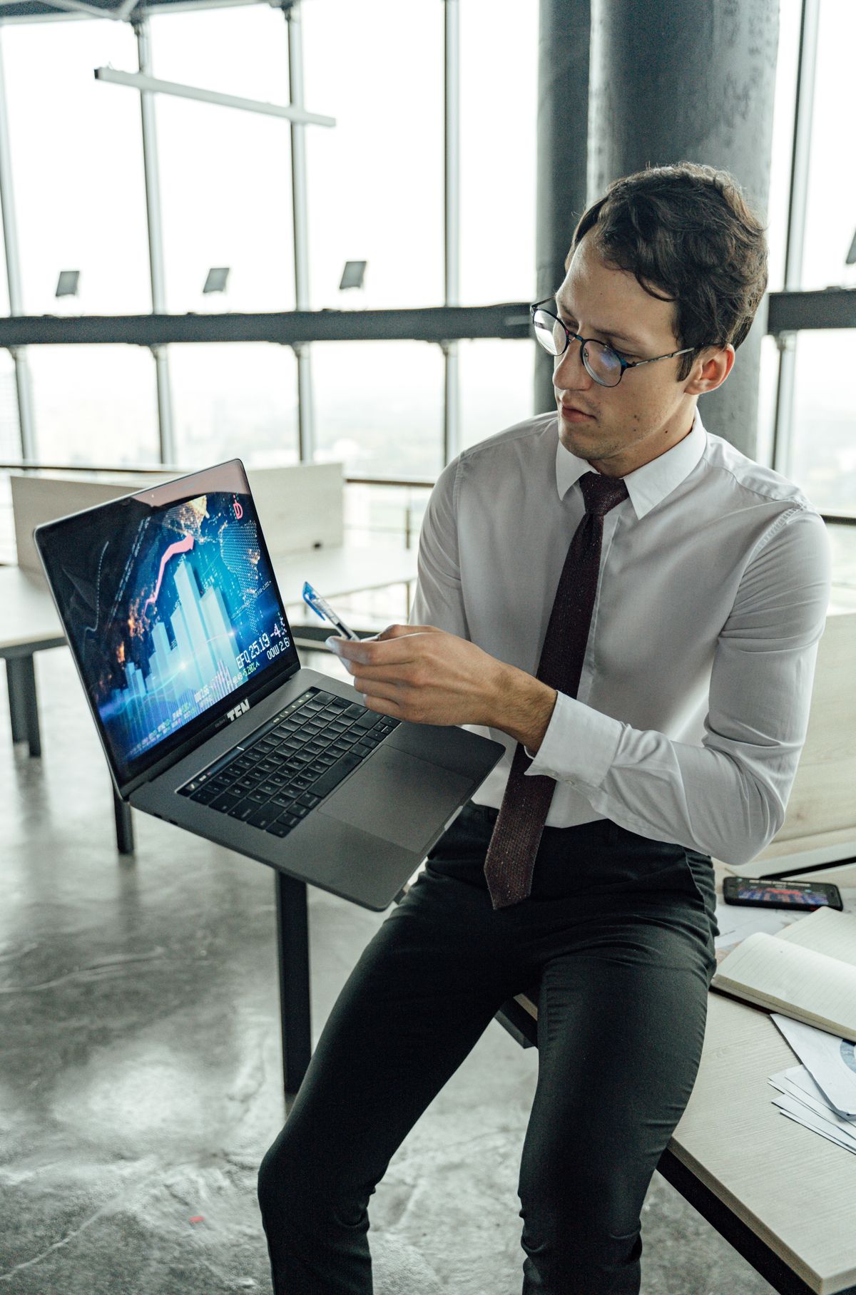 Professional advisor reviewing business information