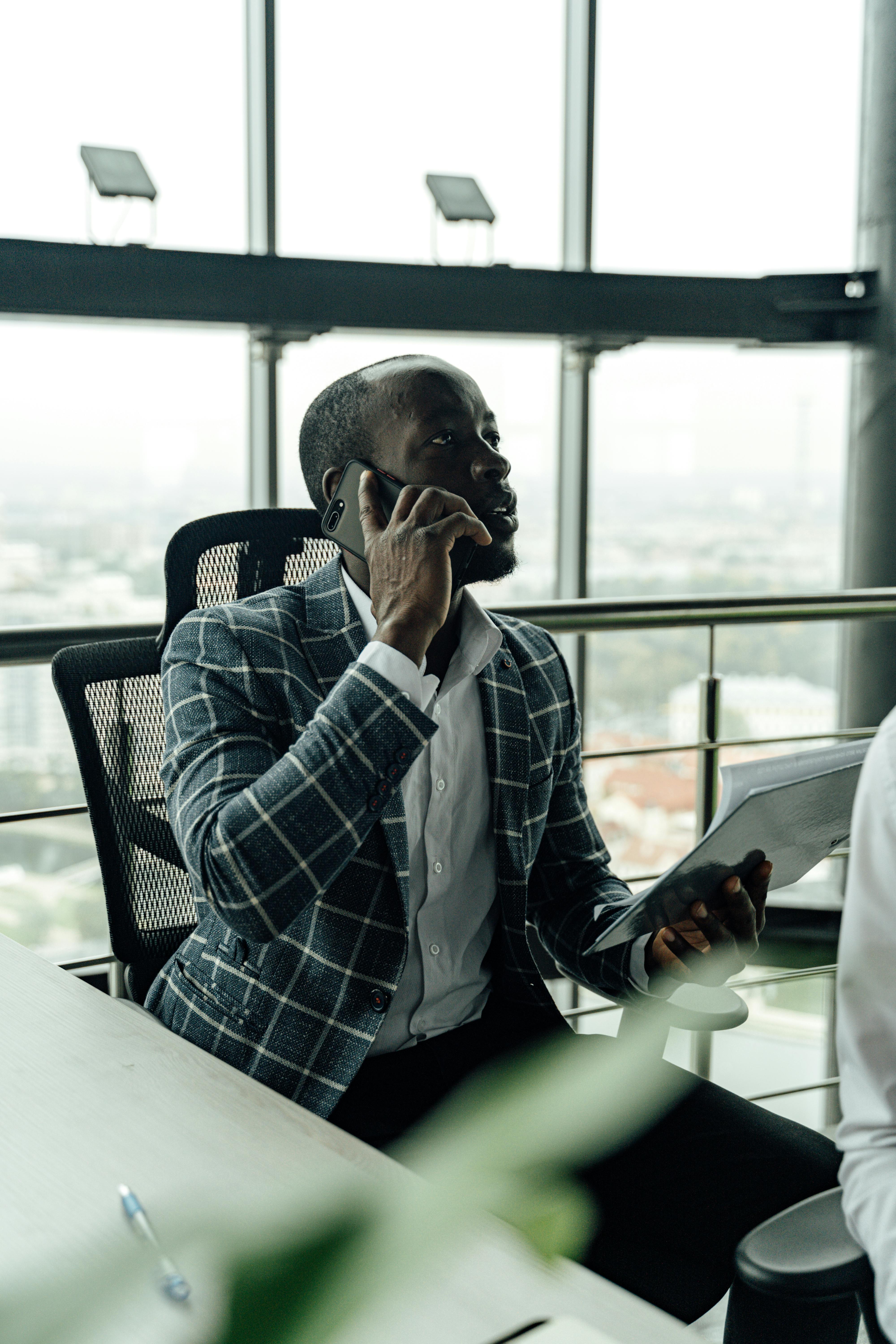 Wrestler walking down entrance ramp with arena lights