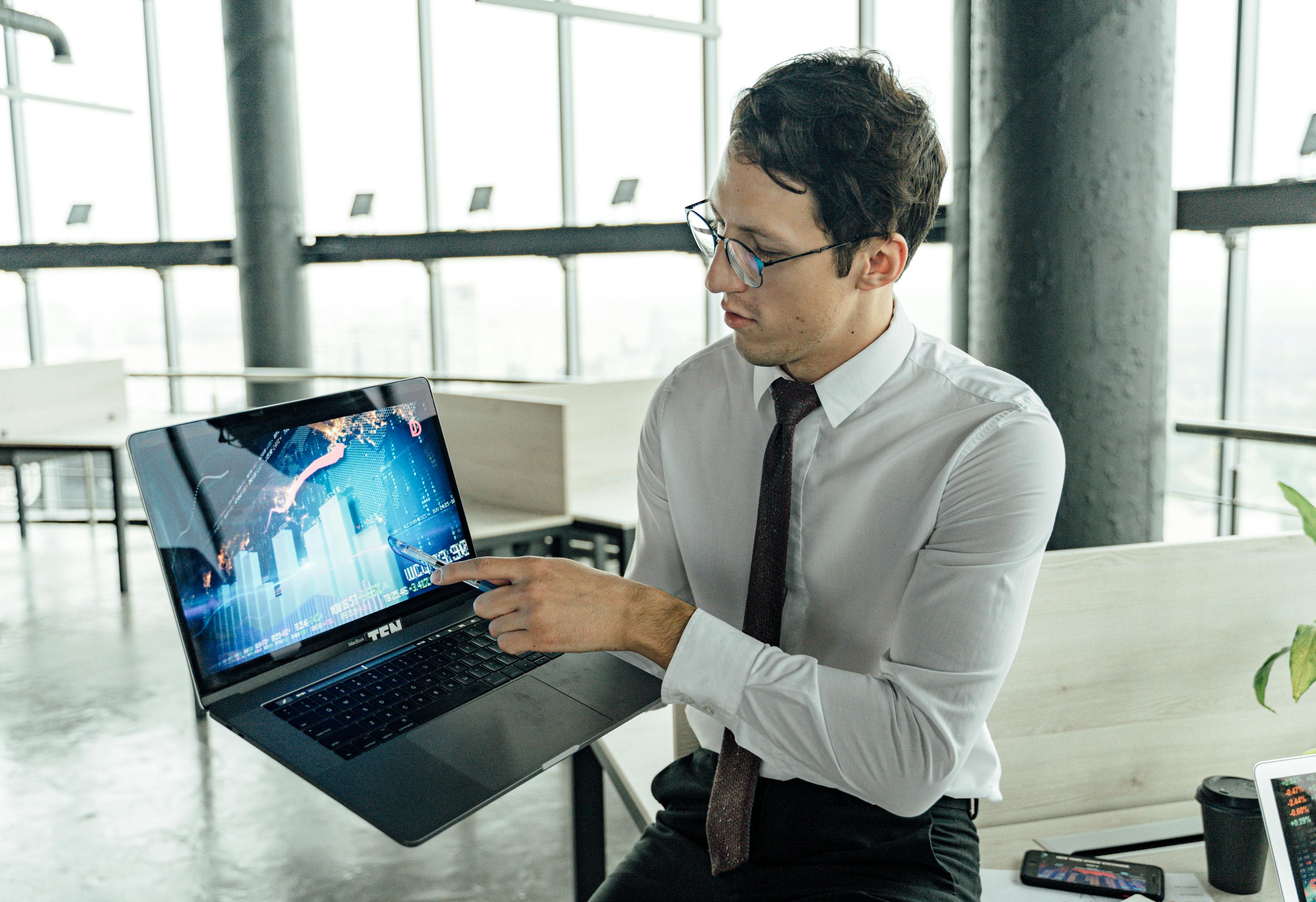 a man discussing using a laptop