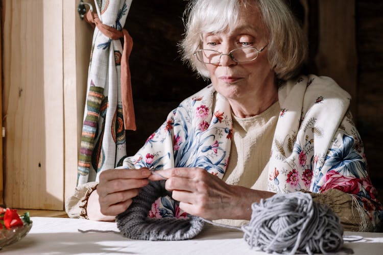 Beautiful Grandmother Knitting A Yarn