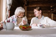 2 Girls Eating on Table