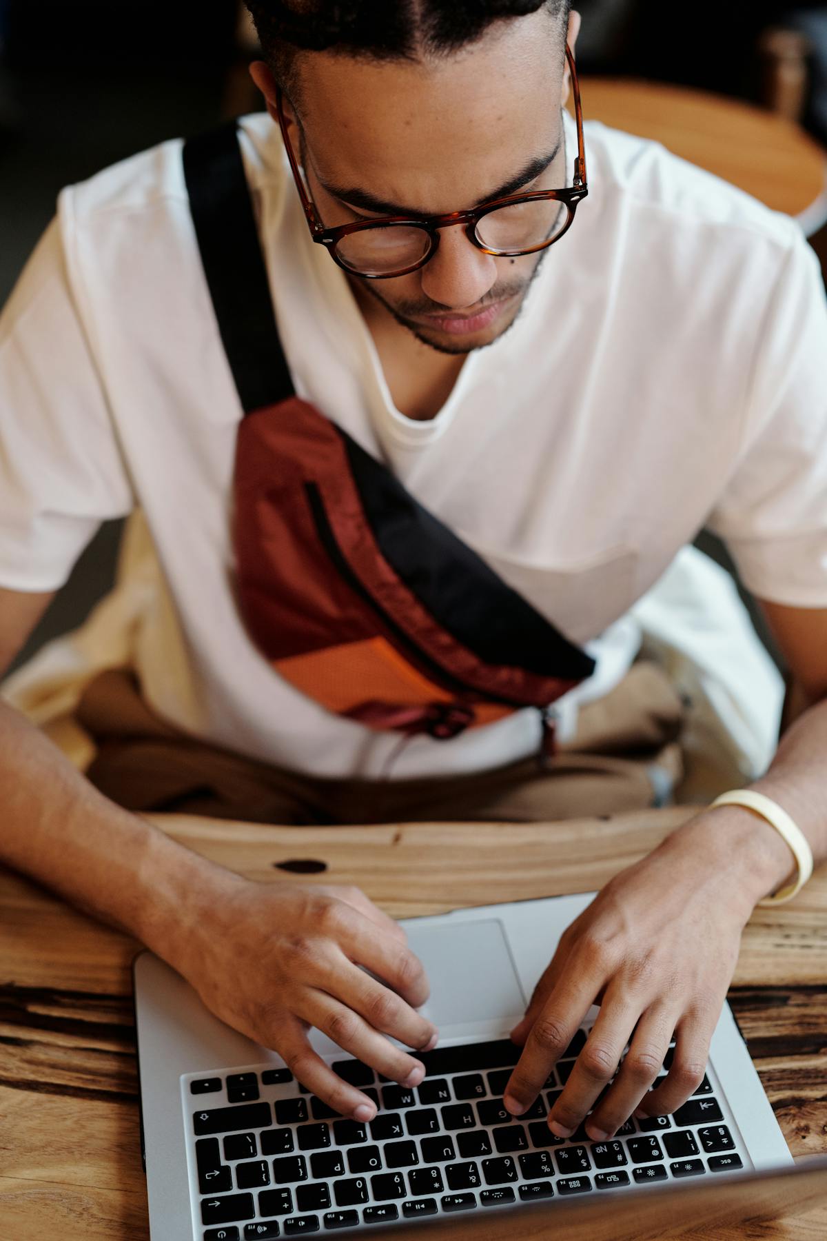 Two wrestlers facing off in a ring with dramatic lighting