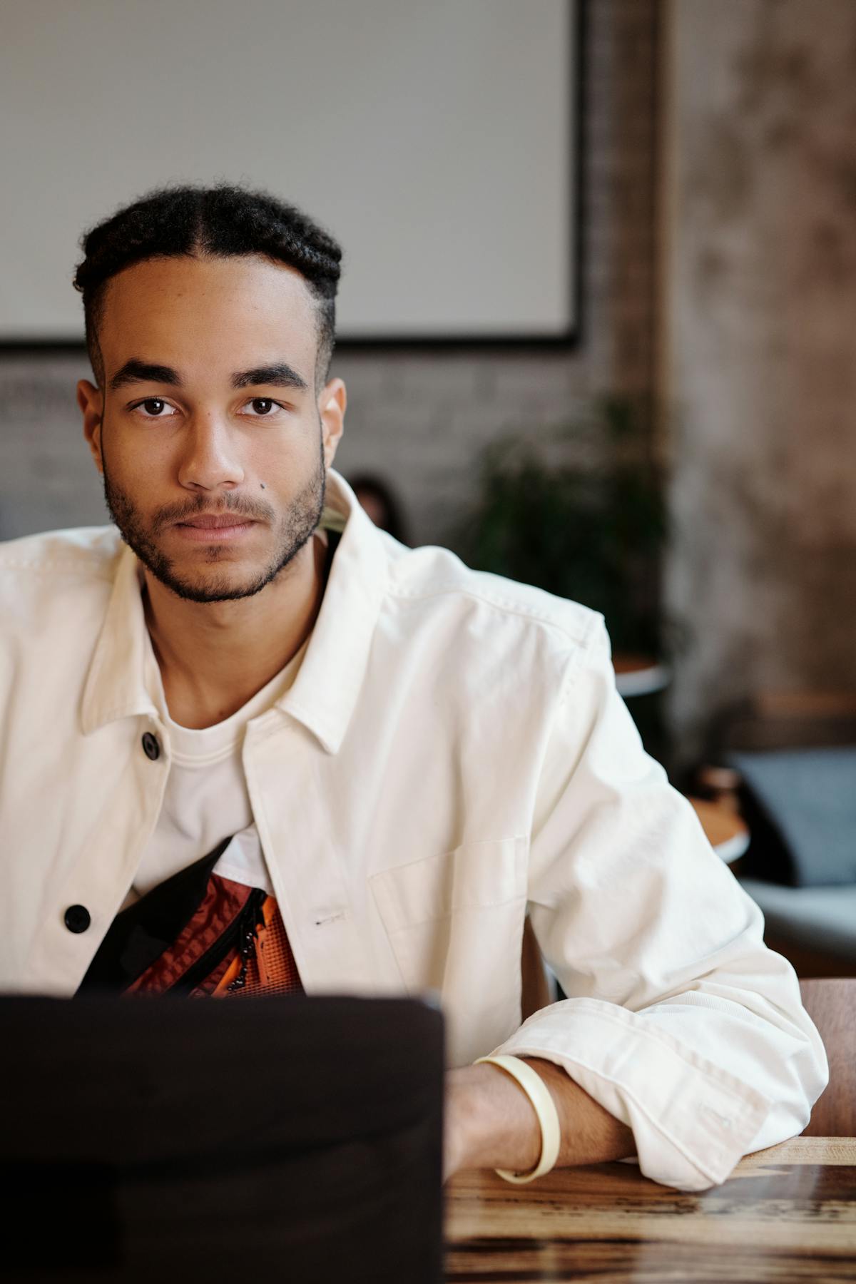 Wrestler entering an arena through smoke and backlight