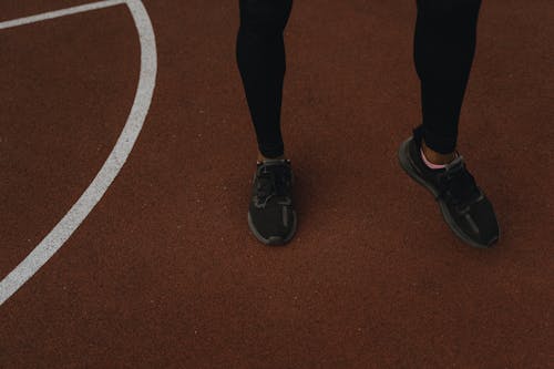 Person in Black Pants and Black Shoes 