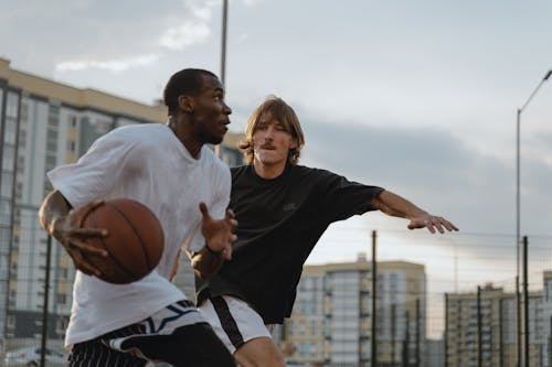Friends Playing a Game of Basketball