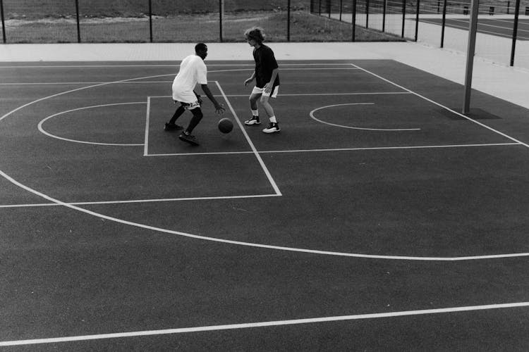 Men Playing Basketball