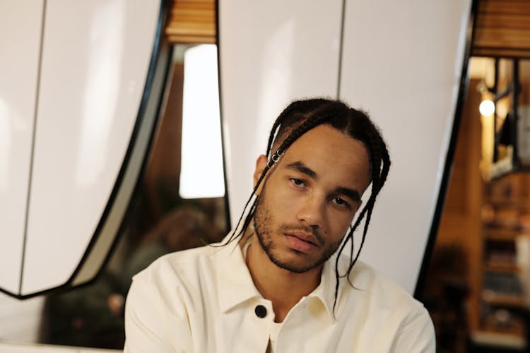 Handsome Man In White Button Down Shirt With Afro Braids