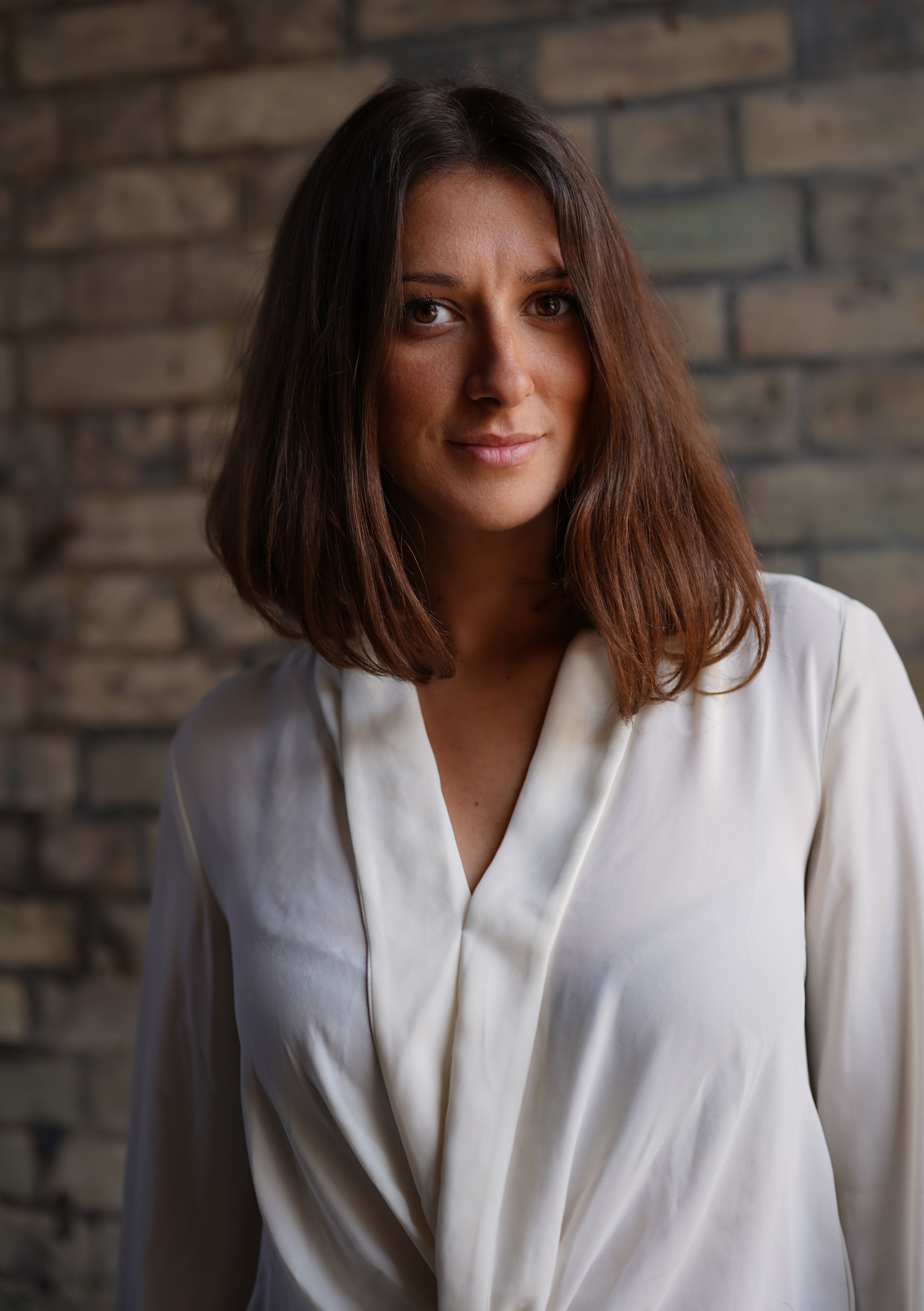 Woman in White Long Sleeve Blouse · Free Stock Photo