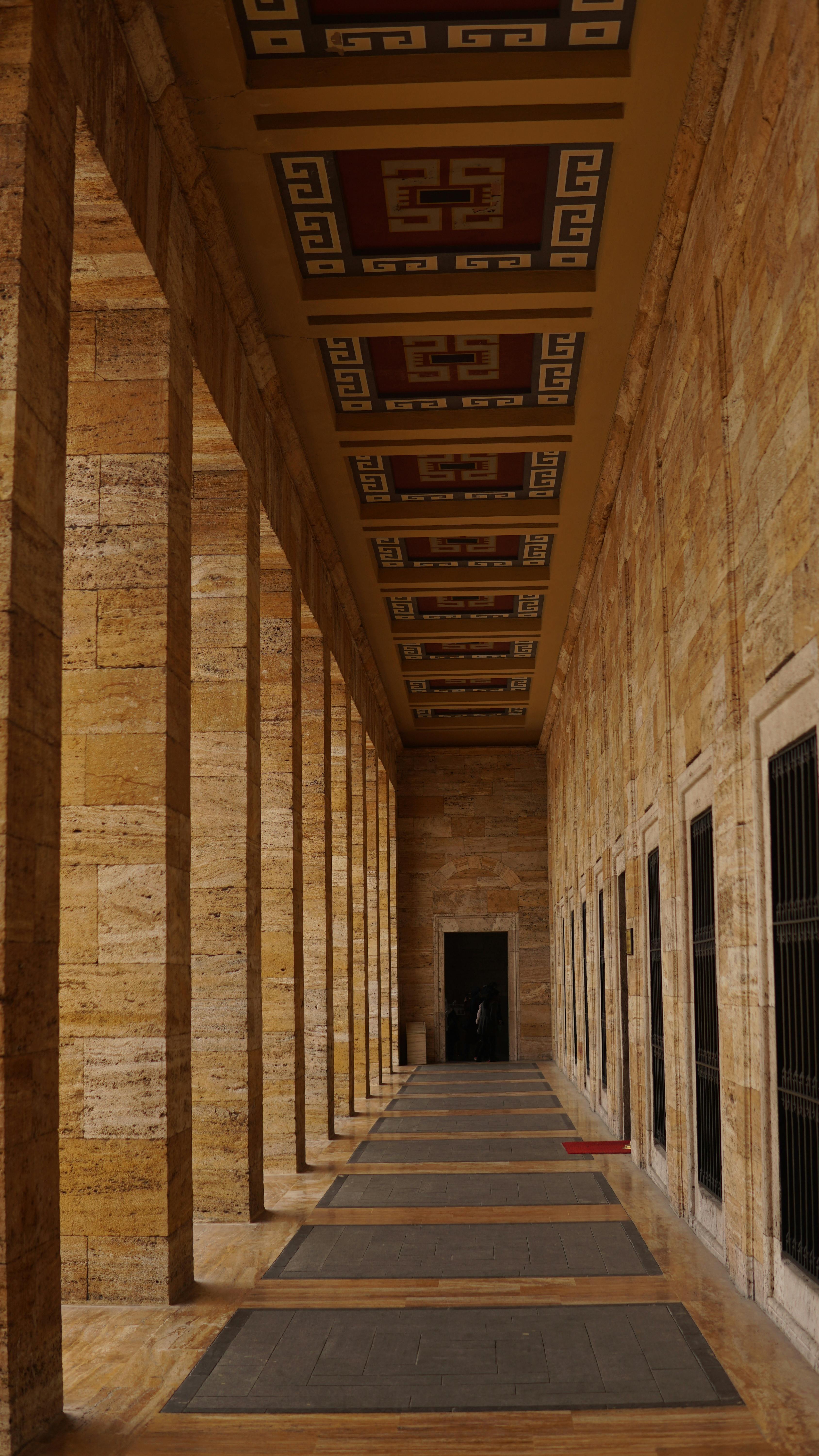 corridor of old stone building with ornament