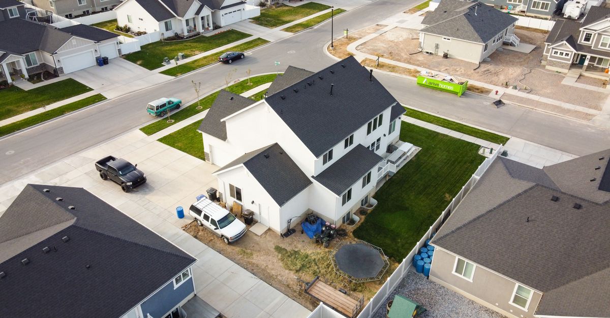 Aerial view of a residential neighborhood in Spanish Fork, Utah showcasing modern houses.