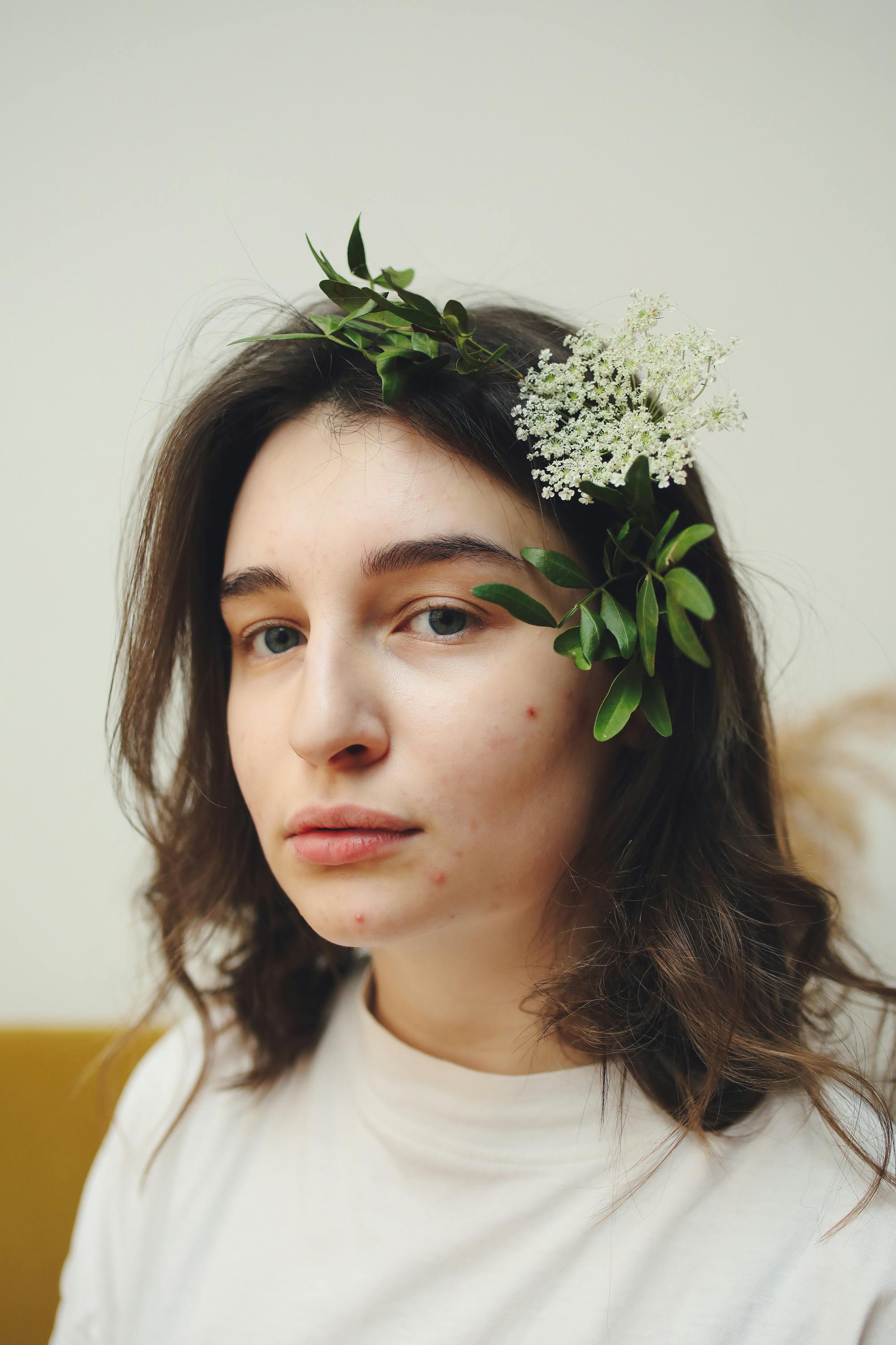 A Woman with Flowers on Her Hair · Free Stock Photo