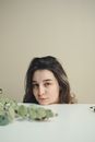 Woman Lying on Green Bed