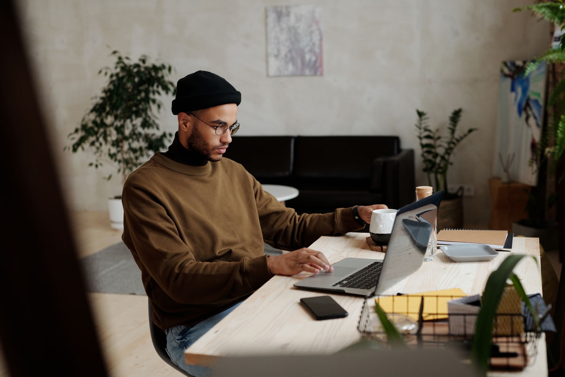 freelancer working focused home office setup