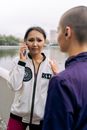 Woman in White and Black Zip Up Jacket