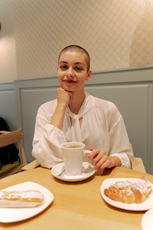 Woman with Short Hair Drinking Coffe